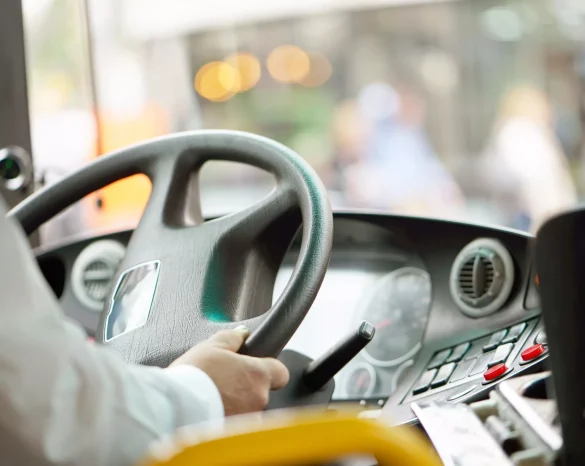 bus-driver-at-the-wheel-scaled.webp